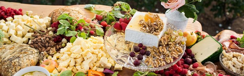 closeup-shot-feast-table-with-various-food-min