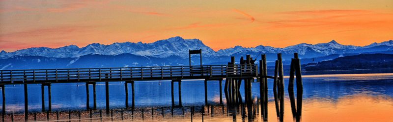 pier-lake-against-sky-sunset